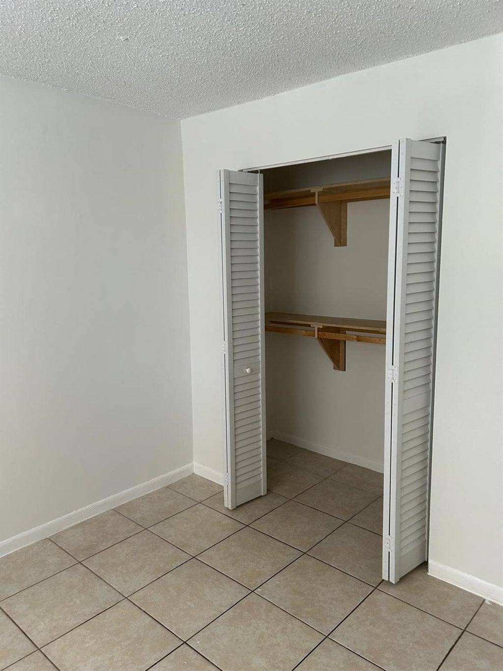 Photo of 850 E COMMERCIAL Boulevard #210A, Oakland Park, FL 33334 (MLS # B26062019)