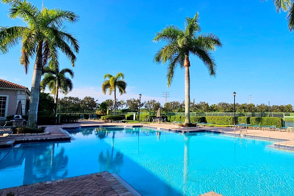Photo of 6760 Heritage Grande #6107, Boynton Beach, FL 33437 (MLS # B26053460)