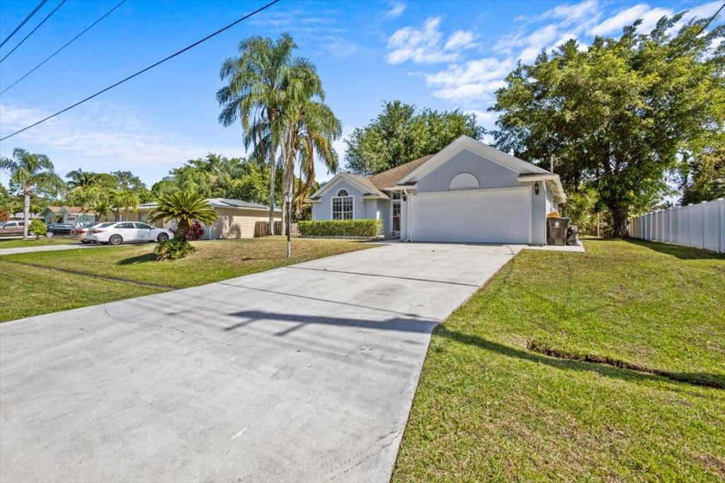 Photo of 242 SW Voltair Terrace, Port Saint Lucie, FL 34953 (MLS # R10971756)