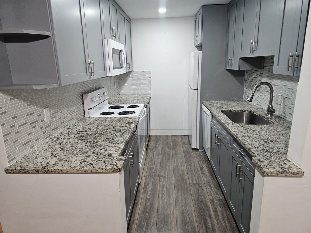 Photo of 3910 Crystal Lake Drive #203, Deerfield Beach, FL 33064 (MLS # F10489822)