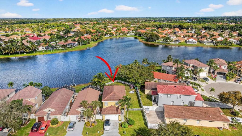 Photo of 7745 Springfield Lake Drive, Lake Worth, FL 33467 (MLS # R11149368)