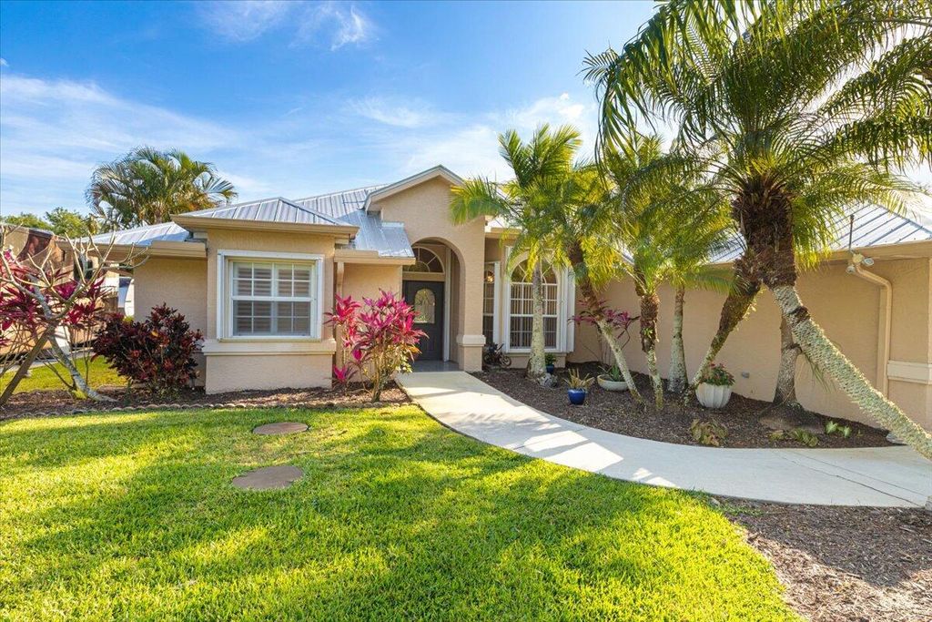 Photo of 891 Woodlands Drive, Port Saint Lucie, FL 34952 (MLS # R10969559)