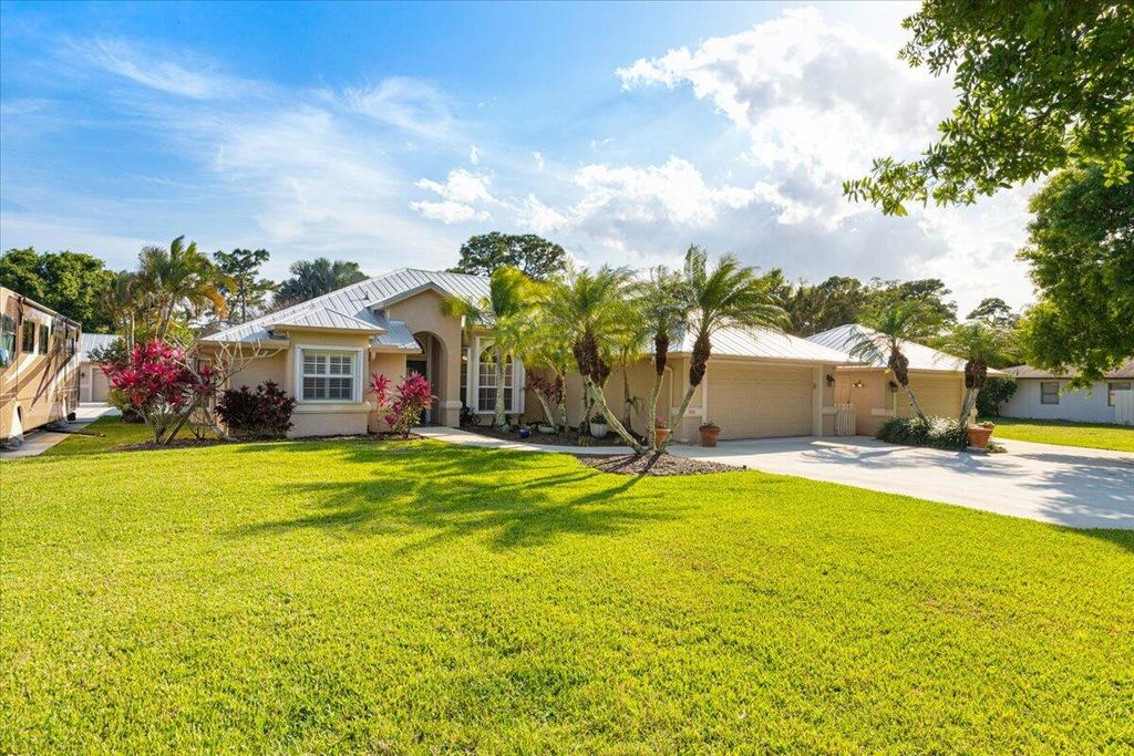 Photo of 891 Woodlands Drive, Port Saint Lucie, FL 34952 (MLS # R10969559)