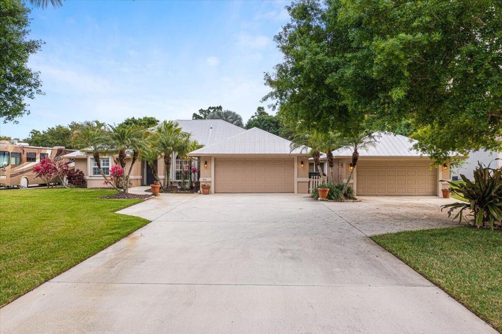 Photo of 891 Woodlands Drive, Port Saint Lucie, FL 34952 (MLS # R10969559)