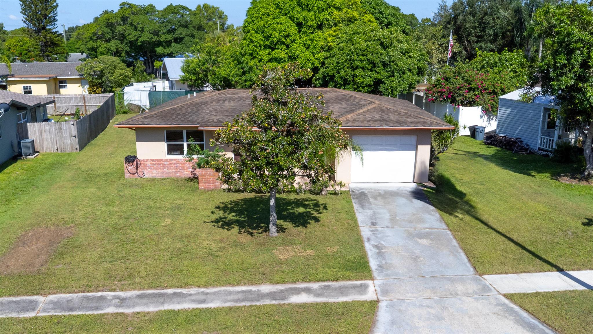 Welcome to these 2 bedrooms, 1.5 bath,1 car garage CBS home located in the heart of River Park neighborhood. Interior features open living spaces enhanced by tile flooring, kitchen with pantry storage and interior laundry area for your convenience. Central heating and cooling ensure year- round of comfort, with low- maintenance finishes, ideal as a starter home, cozy downsizing option or for investment. Yard offers generous space to park your toys, has mature night blooming jasmine, magnolia and fruit tree. Convenient access to US-1, and local amenities.