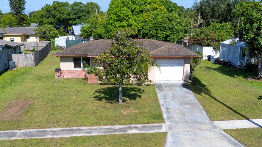 Looking for an affordable home, downsizing or investment? Look no further! Welcome to this 2 Bedroom,1 and a half bath possible 3 bedroom, located in the heart of Port Saint Lucie. Home features: tiles and laminate flooring, Brand New garage door and Seller will put a brand-new roof with an acceptable offer.