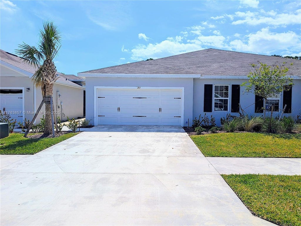 Photo of 285 Raspberry Road, Fort Pierce, FL 34981 (MLS # B26073881)