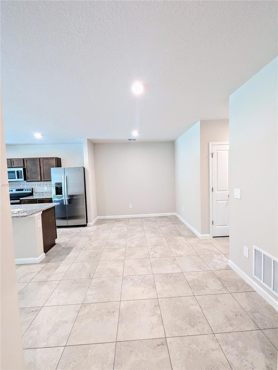 Photo of 285 Raspberry Road, Fort Pierce, FL 34981 (MLS # B26073881)