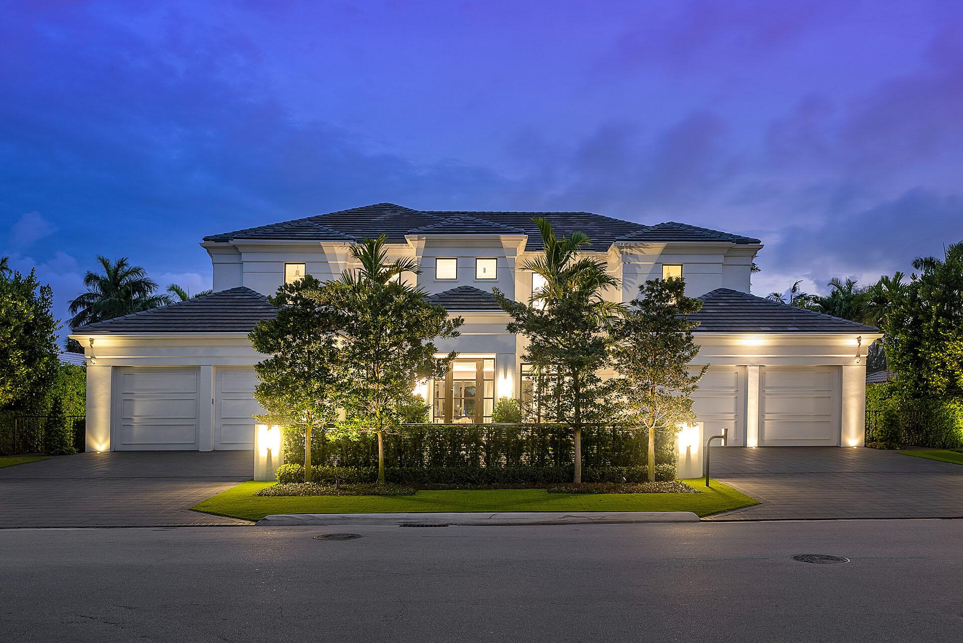 Premium location within Royal Palm Yacht & Country Club on the brand-new Jack Nicklaus Signature Golf Course. 170 Royal Palm Way is a turnkey SRD Building Corp. Signature Estate that offers a slice of paradise with 102' of golf course frontage. Contemporary chic style is found inside the 5 bedroom, 7,200+ living space with an open floor plan, towering windows, and trendy interiors. The home includes a formal dining area, club room with stunning bar, dedicated study, multiple living rooms, and a sprawling 1st-floor main suite complete with morning bar, glass shower room, and His & Her boutique closets. The backyard has southern exposure and is a tropical escape. The dazzling pool is the perfect centerpiece, wrapped by a large patio, covered loggia, summer kitchen, and infinite golf views.