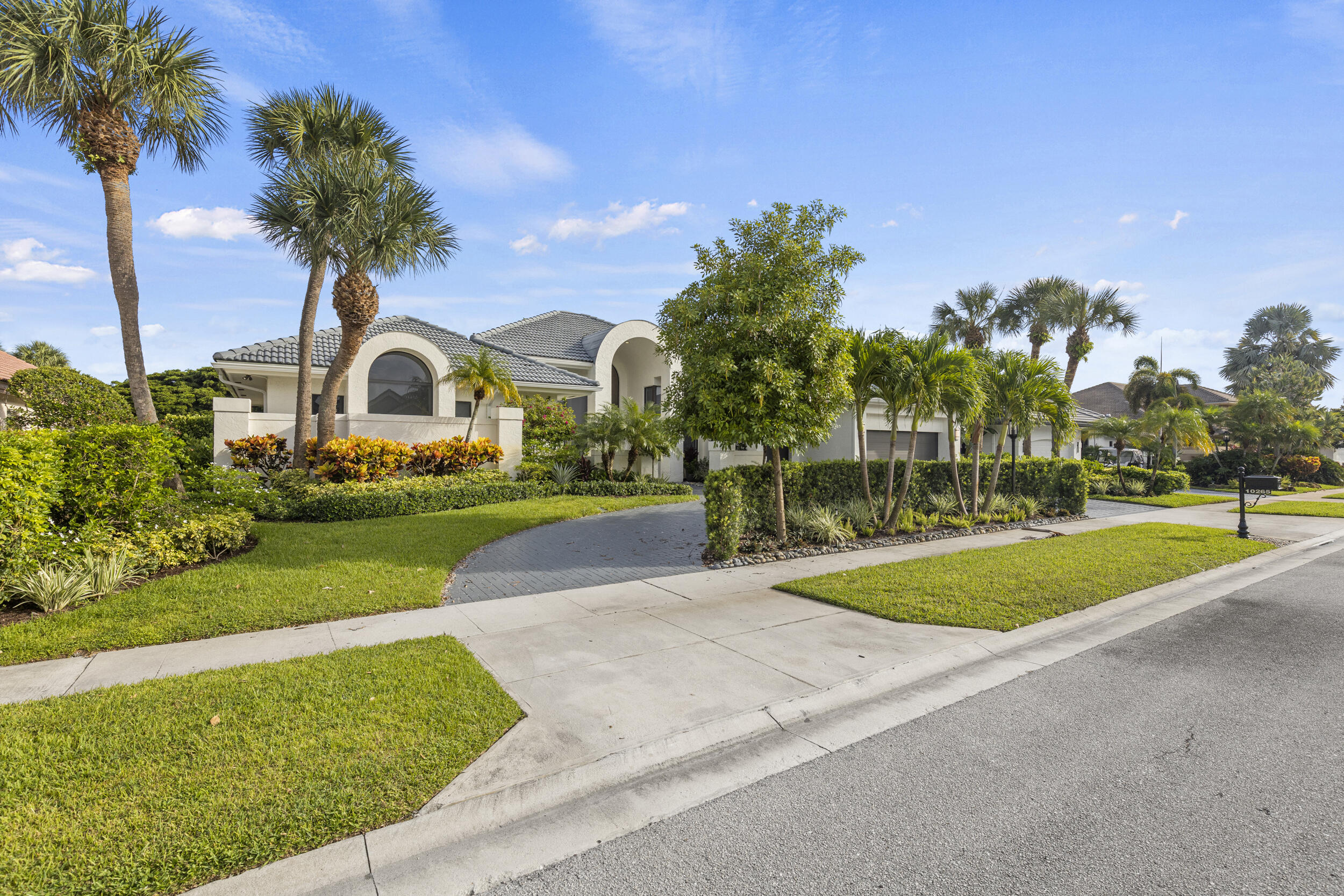 WELCOME to the Stonebridge Country Club! Every room and surface in this home has been completely redone--floor to ceiling--with high-end finishes throughout. All windows and doors, including garage doors, are impact-rated (two with built-in hurricane shutters). Professionally redesigned landscaping by a landscape architect includes a fenced-in dog run. The interior features wood flooring throughout, new tile and fixtures in all bathrooms, upgraded lighting, and custom closets for maximum storage. Enjoy serene golf course views of the signature par-5 10th hole from the screened-in pool and patio.