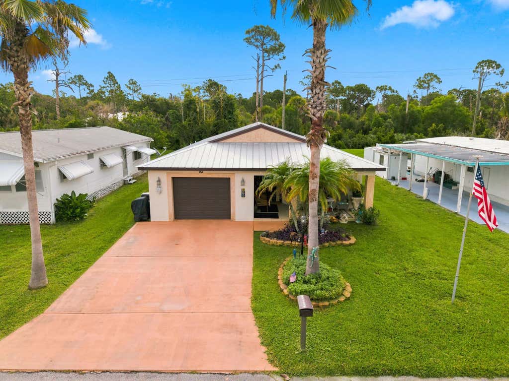 Photo of 82 Mediterranean Boulevard E, Port Saint Lucie, FL 34952 (MLS # B26062690)
