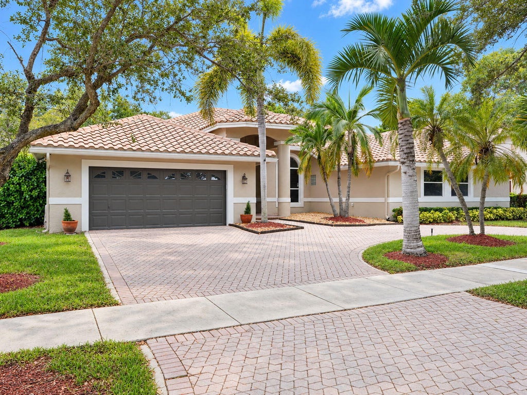 Photo of 1776 Eagle Trace Boulevard W, Coral Springs, FL 33071 (MLS # B26091577)