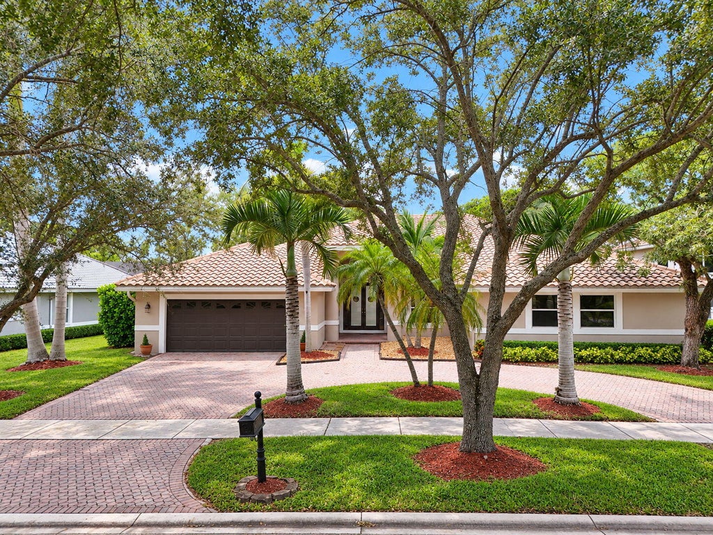 Photo of 1776 Eagle Trace Boulevard W, Coral Springs, FL 33071 (MLS # B26091577)