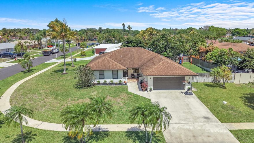 In the heart of Royal Palm Beach, 107SegoviaAvenue is an updated CBS home whose concrete block construction with reinforcing steel and stucco offers durability and storm resilience. The singlestory layout features an open floor plan anchored by a generous, renovated kitchen and flows into bright living and dining spaces. Set on a fenced corner lot with plenty of room for a pool, it provides privacy and room to grow. The address is a short stroll to Arated H.L.Johnson Elementary School  and roughly two miles to Crestwood Community Middle School and Royal Palm Beach High School , with a nearby park, dog park and other village amenities.