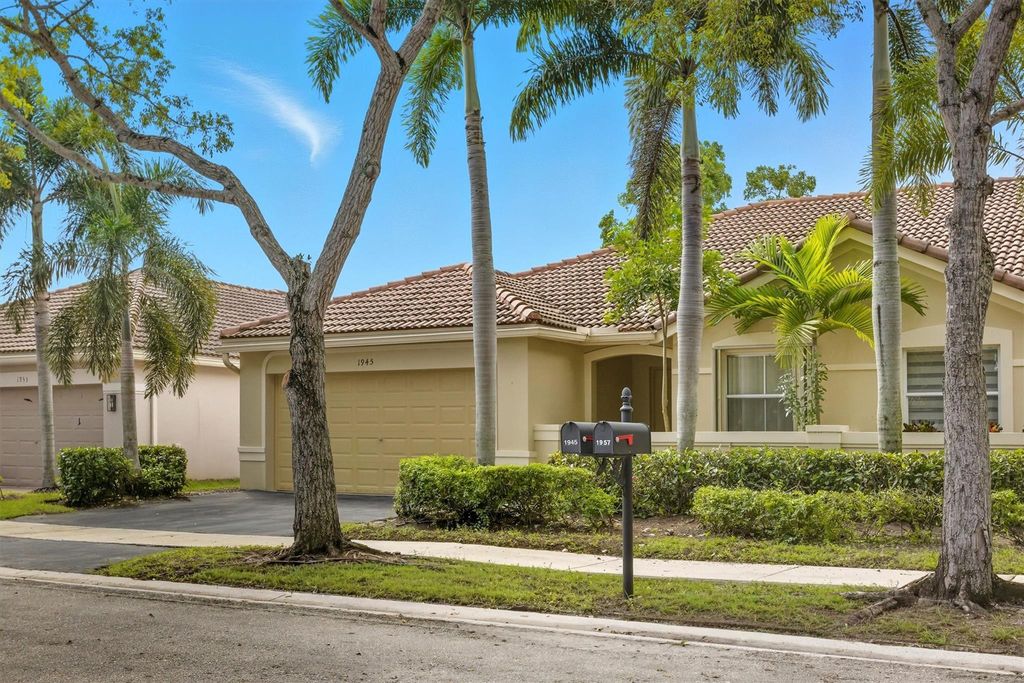 Photo of 1945 Sirius Lane, Weston, FL 33327 (MLS # F10519387)