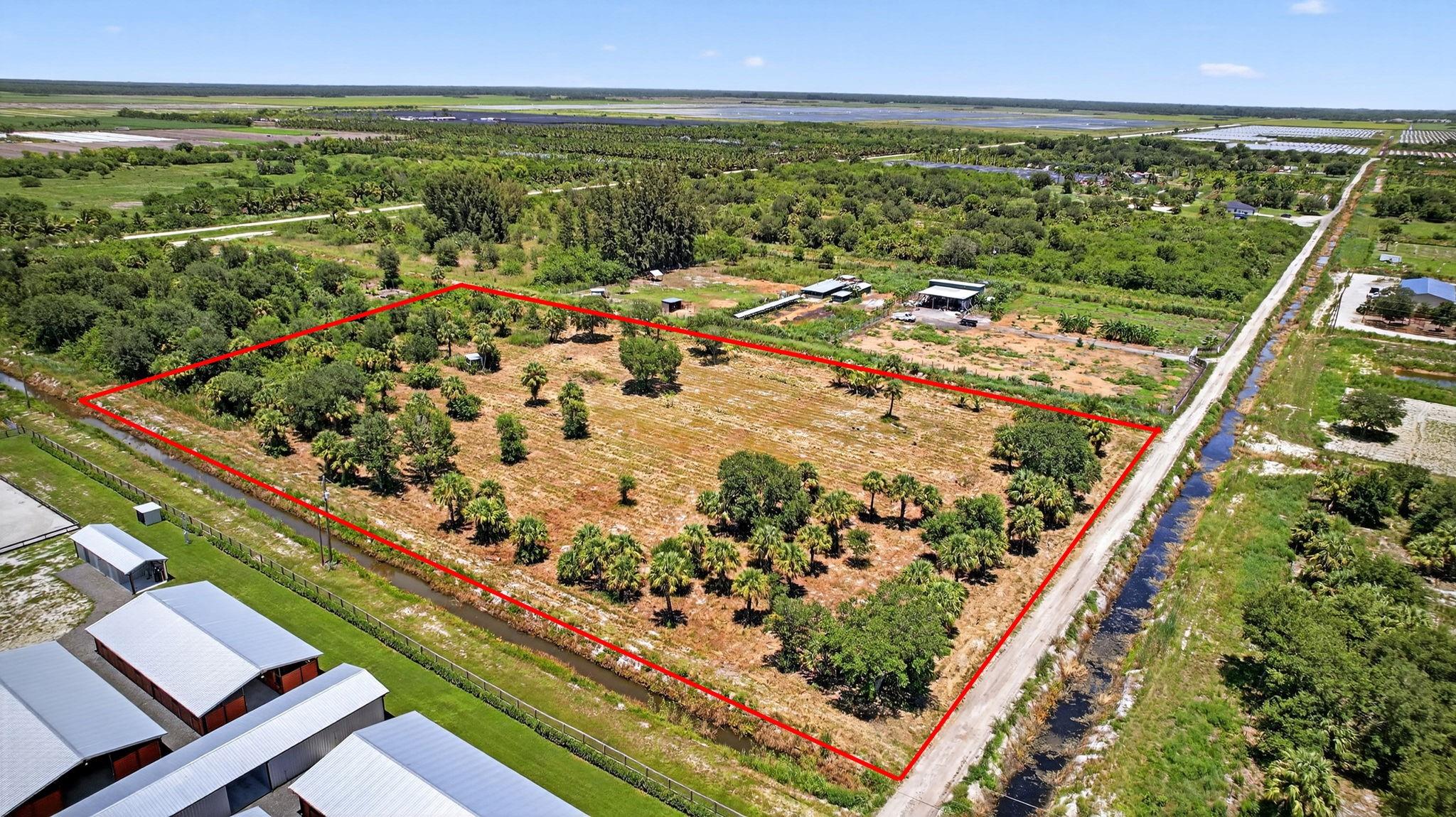 Incredible opportunity to own a prime lot in Loxahatchee within the Indian Trails Improvement District. Located on a quiet road with no through traffic thanks to recent road closures. Power pole already installed nearby, saving thousands on electric setup. Surrounded by charming neighbors including a boutique riding academy and small nursery. Major infrastructure upgrades underway- road milling and culvert improvements for better access. Unlike other lots nearby, this one has no commercial farming adjacent and is not landlocked from utilities. A truly superior location with long-term potential, close to future development yet protected from its traffic. Ideal for building your dream home, private estate, or equestrian retreat. Enjoy the best of country living with smart investment upside!