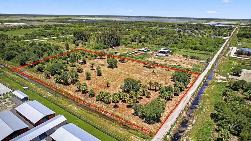 Incredible opportunity to own a prime lot in Loxahatchee within the Indian Trails Improvement District. Located on a quiet road with no through traffic thanks to recent road closures. Power pole already installed nearby, saving thousands on electric setup. Surrounded by charming neighbors including a boutique riding academy and small nursery. Major infrastructure upgrades underway- road milling and culvert improvements for better access. Unlike other lots nearby, this one has no commercial farming adjacent and is not landlocked from utilities. A truly superior location with long-term potential, close to future development yet protected from its traffic. Ideal for building your dream home, private estate, or equestrian retreat. Enjoy the best of country living with smart investment upside!