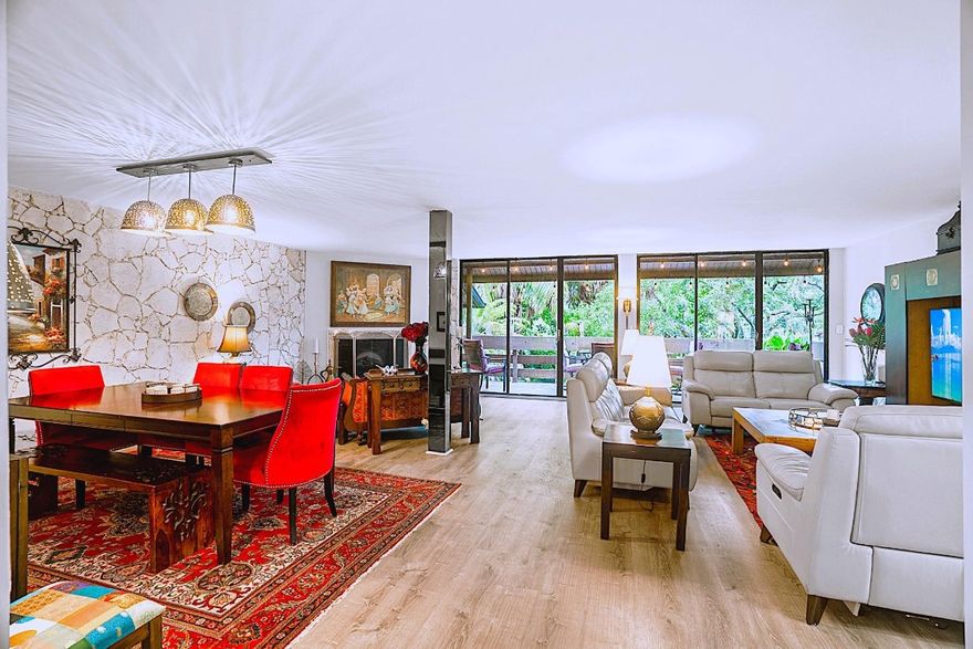 OPEN HOUSE SUN. JAN 11TH! *2,240 SQ. FT* of gracious living on the corner. Featuring 3 BIG bedrooms - 2.5 baths plus an office/storeroom a one of a kind home. Recently added highly upgrade amenities throughout: Dramatic stone accent wall, sleek glass stair case, cozy up to the wood-burning fireplace, create a gourmet meal in the chef’s dream kitchen: ultra-luxury appliances, jaw-dropping 6-ft wide refrigerator/freezer, custom cabinets and more! Save money while enjoying endless tankless hot water, two-zone AC, S-P-A-C-I-O-U-S closet with built-ins and a safe and custom vanities. Step onto two expansive balconies offering panoramic golf course views and more storage. Impeccably designed for entertaining or serene relaxation, rare gem priced below market value. Light fixtures to be replaced.