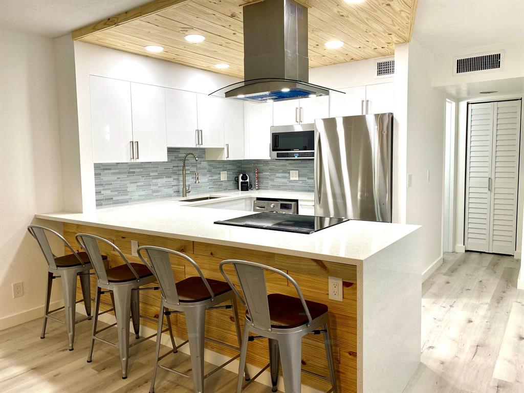 Charming, modern 1/1 apartment completely renovated from top to bottom! Beautiful kitchen with stainless appliances, newer bathroom design, an open bright floor plan, LED lighting, and a spacious patio overlooking community pool perfect to relax and unwind! Complete impact windows and doors. Great location accessible to restaurants, shops, highways, etc...Monthly rent includes water, internet and cable.