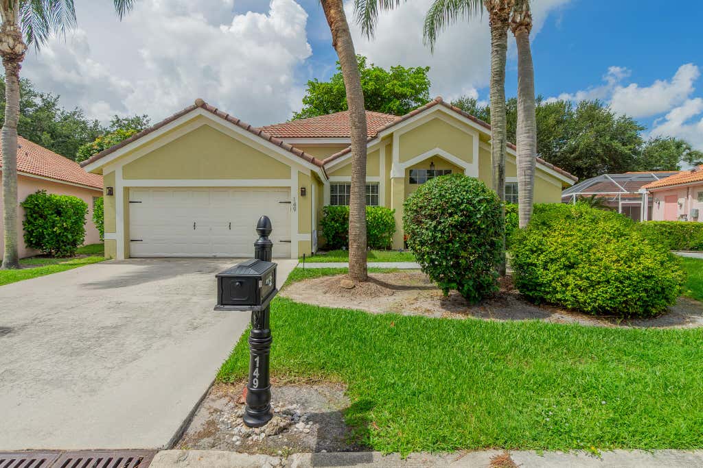 Photo of 149 Cove Road, Greenacres, FL 33413 (MLS # B26050716)