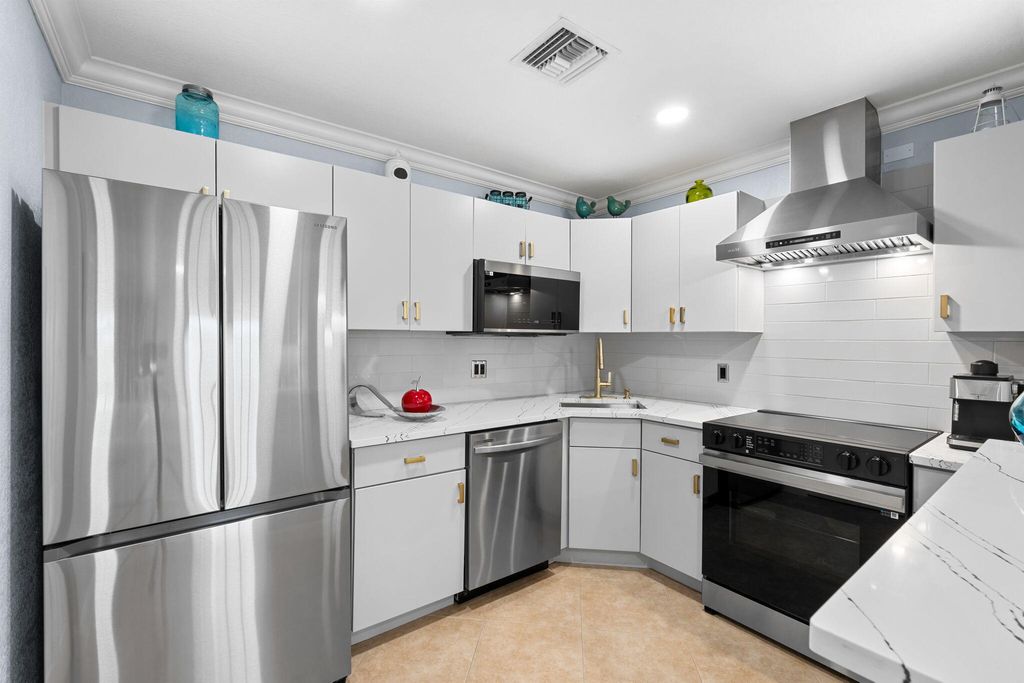 Photo of 506 Shady Pine Way #A2, Greenacres, FL 33415 (MLS # B26007404)