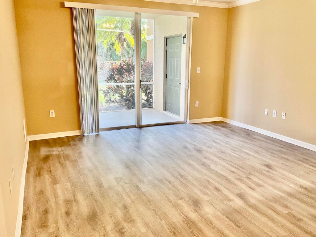 Photo of 6492 Emerald Dunes Drive #106, West Palm Beach, FL 33411 (MLS # B26002689)