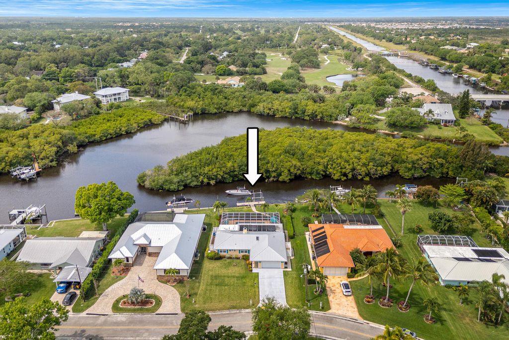 Photo of 522 SW Pine Tree Lane, Palm City, FL 34990 (MLS # R10967938)