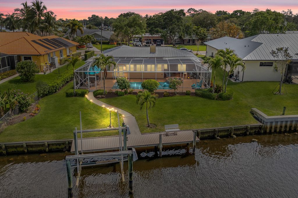 Photo of 522 SW Pine Tree Lane, Palm City, FL 34990 (MLS # R10967938)