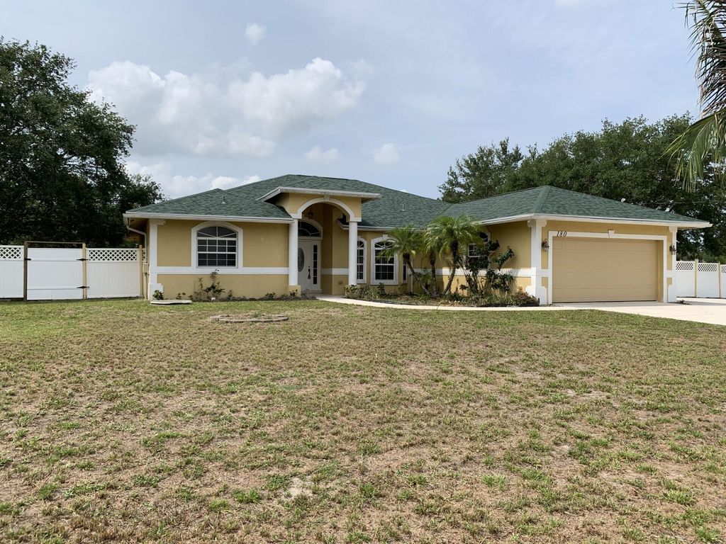 Photo of 180 SW Oakridge Drive, Port Saint Lucie, FL 34984 (MLS # B26028417)