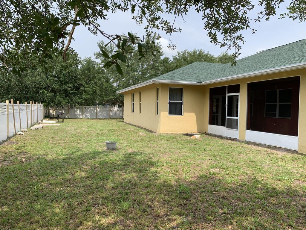 Photo of 180 SW Oakridge Drive, Port Saint Lucie, FL 34984 (MLS # B26028417)