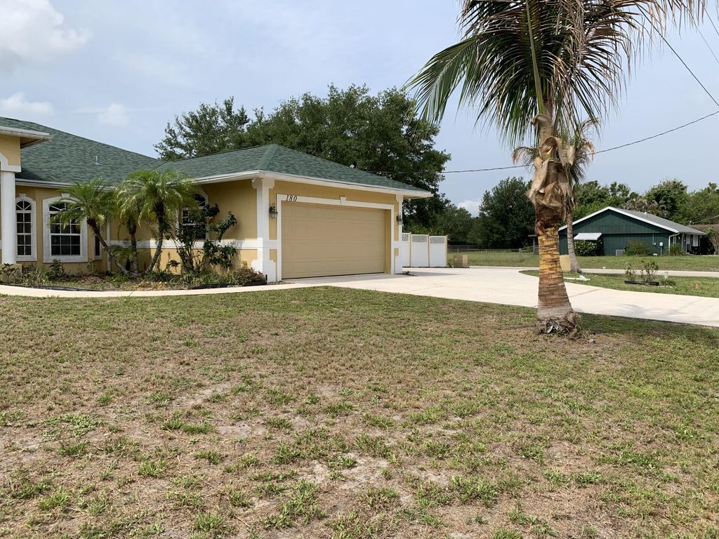 Photo of 180 SW Oakridge Drive, Port Saint Lucie, FL 34984 (MLS # B26028417)