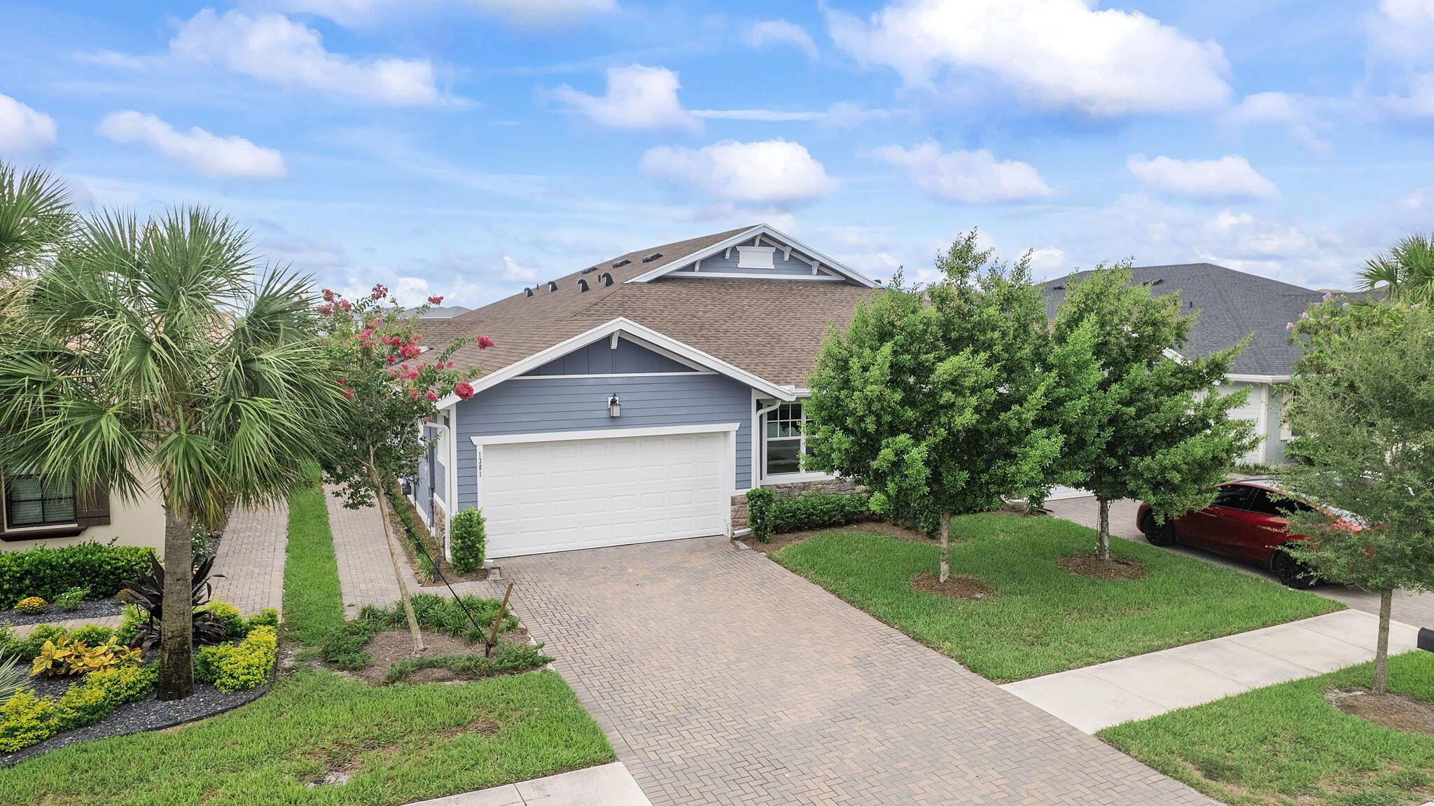 Transfer of LOVE ~ Charming 3 bedroom, 2 bathroom with 2 car garage in the sought after gated community of Arden. Beautiful kitchen with stainless steel appliances and quartz countertops. This home features a screened patio for relaxing and a beautiful array of fruit trees in the backyard with water filtration system. Resort style amenities including clubhouse, library, cafe, fitness center, two sparkling pools, jacuzzi, tennis, pickleball and even a lazy river! Sustainable community farm where residents can enjoy fresh produce and connect with neighbors.