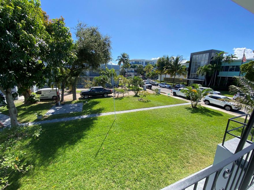 Welcome to this incredibly updated Studio oasis in the heart of downtown Lake Worth Beach! This newly updated early 1950's gem is a one-of-a-kind sanctuary that seamlessly blends history and modern comfort. Unit can be rented un-furnished or furnished. The living space is perfect for unwinding after a long day at work, with a fully equipped modern kitchen and relax viewing the  gorgeous grounds from 2nd floor balcony with a cup of coffee in the morning or sip a glass of wine in the evening. Vibrant downtown is just a half a block away known for its artistic flair, eclectic shops, and delectable dining options. The beach is just a short walk or bike ride away also. You can not get a better location! Owner running special: Move in with only first month's rent and security deposit