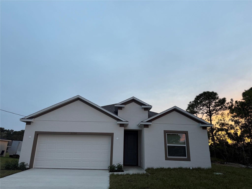 Photo of 1918 SW Monterrey Lane, Port Saint Lucie, FL 34953 (MLS # F10492256)