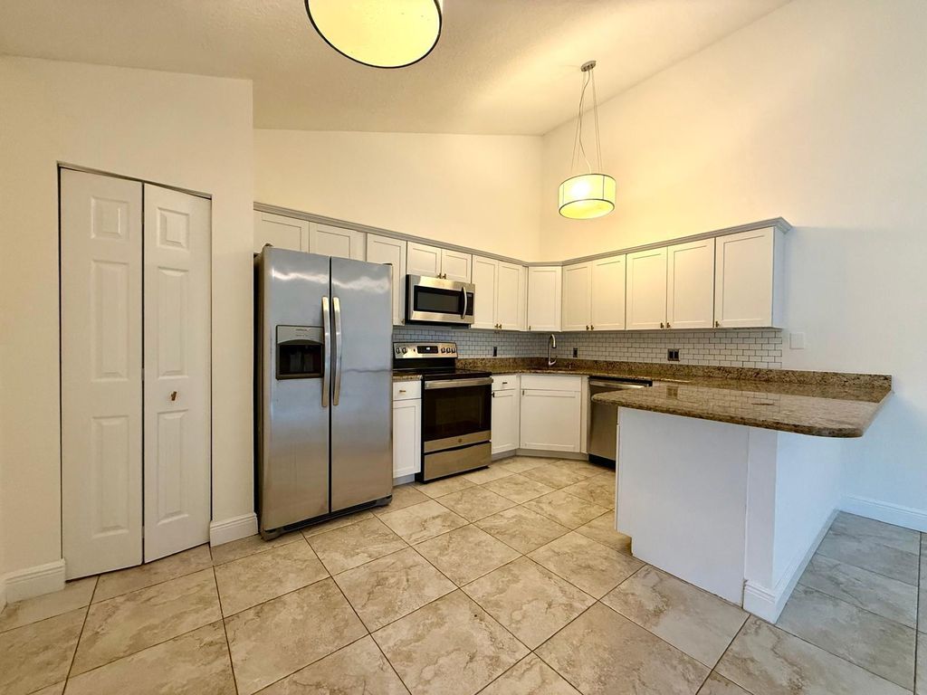 Photo of 5392 Eagle Lake Drive, Palm Beach Gardens, FL 33418 (MLS # R11048538)