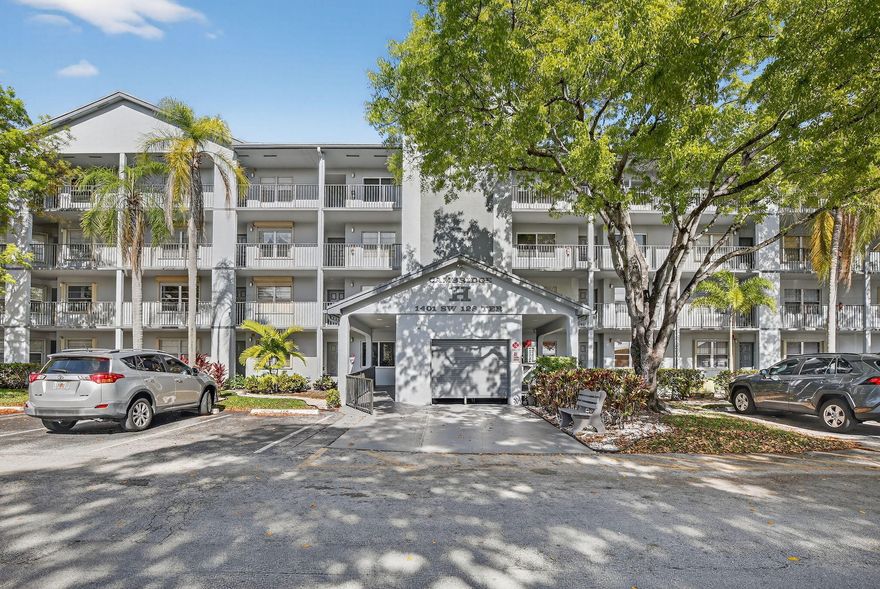 Experience the ultimate in active adult living in this spacious corner unit located in the prestigious 55+ community of Century Village. This home features a private screened-in balcony with serene views, perfect for enjoying the Florida breeze in a peaceful setting. Residents enjoy unparalleled access to a world-class, multi-million dollar clubhouse and a resort-style lifestyle that includes a 1000+ seat theater, fitness center, and multiple sparkling pools. Whether you are hitting the 18-hole golf course, engaging in a match on the tennis and pickleball courts, or participating in a wide array of social clubs, there is always something to do. Combining comfort, 24/7 gated security, and endless recreational opportunities, this property offers the gold standard for vibrant senior living.