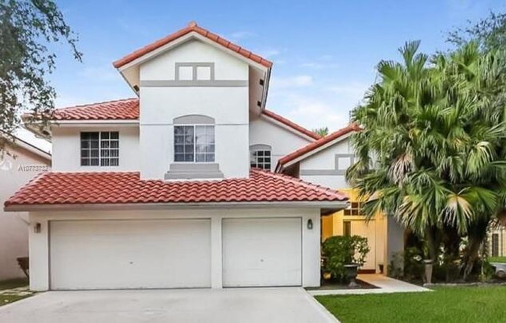 Photo of 8341 NW 57th Drive, Coral Springs, FL 33067 (MLS # R10724167)