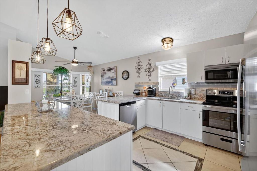 Photo of 14148 Cisne Circle, Fort Pierce, FL 34951 (MLS # R11133480)