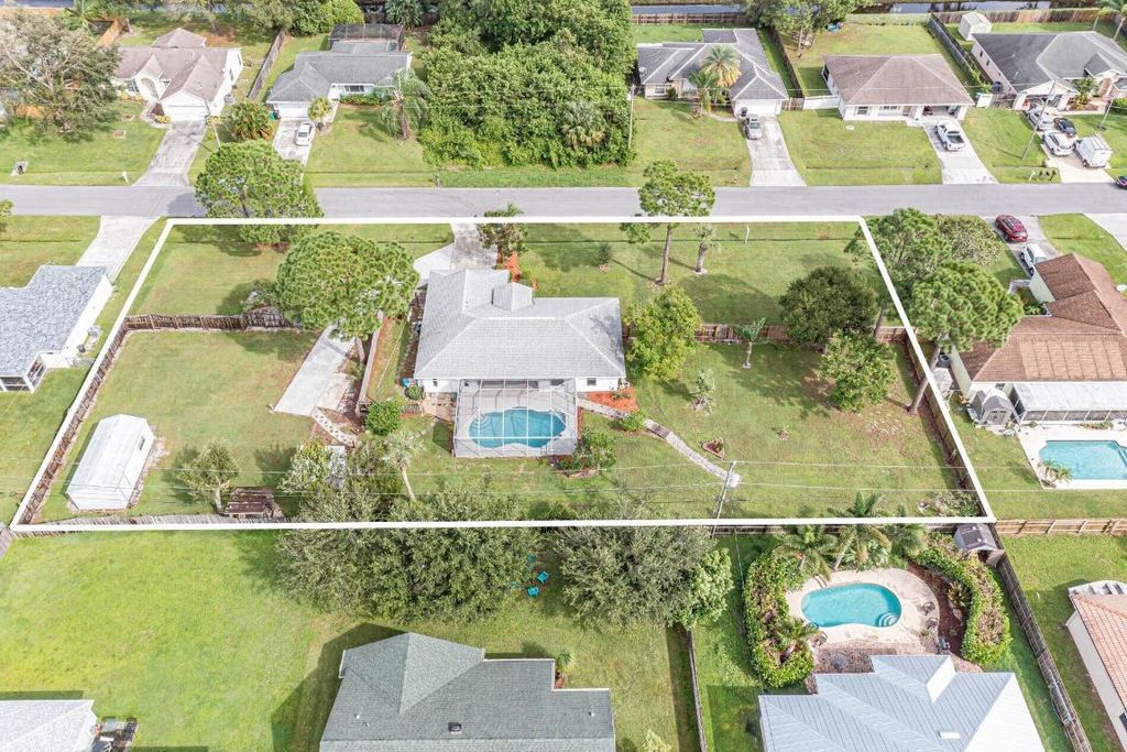 Photo of 1622 SW Alvaton Avenue, Port Saint Lucie, FL 34953 (MLS # R10927230)