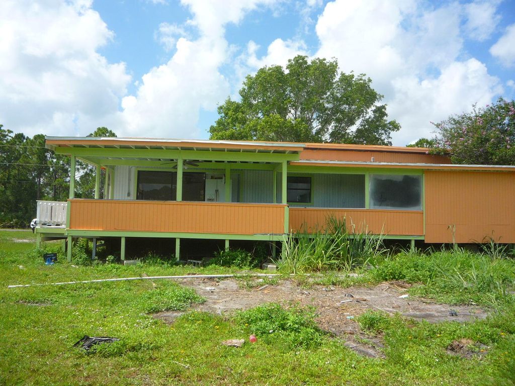 Photo of 2550 Tilton Road, Port Saint Lucie, FL 34952 (MLS # B26045198)