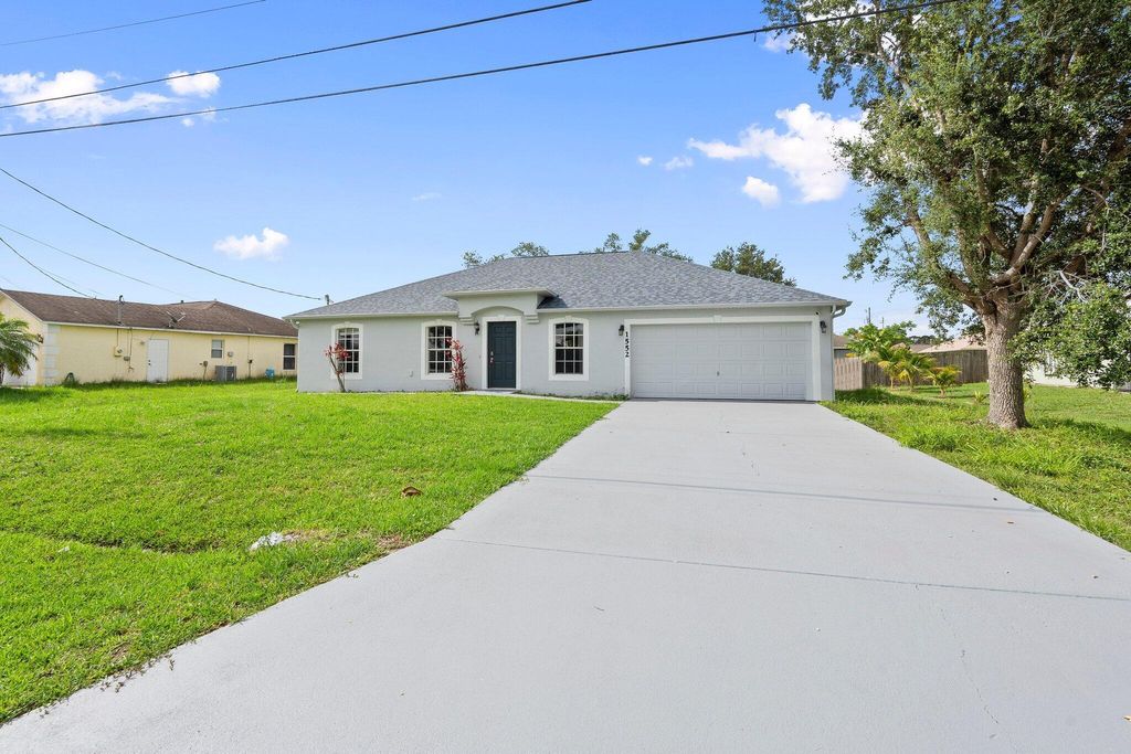 Photo of 1552 SW Neponset Road, Port Saint Lucie, FL 34953 (MLS # R11095722)