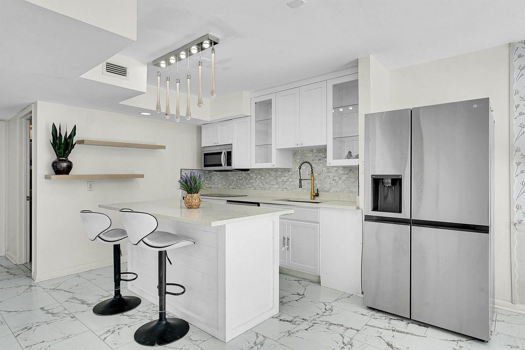 Photo of 9056 Green Meadows Way, Palm Beach Gardens, FL 33418 (MLS # R11142993)