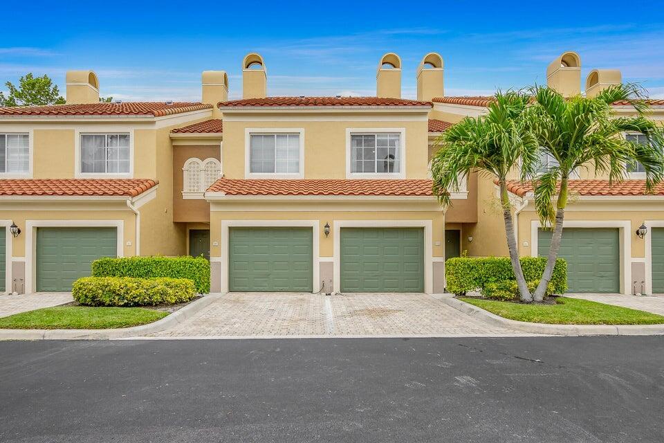 Experience the ultimate Wellington lifestyle in this stunning, renovated townhouse located in the prestigious gated community of St. Andrews. Located just minutes from WEF, Global Dressage, & the National Polo Center, this furnished seasonal rental offers both style & convenience for the equestrian season. The spacious, open-concept layout boasts a gorgeous white chef's kitchen, elegant dining area, & inviting living room each flowing seamlessly to a screened patio with tranquil garden views. Upstairs, enjoy two luxurious master suites, ideal for hosting family or guests in comfort. Community amenities include a resort-style pool, fitness center, tennis courts, & game room, creating the perfect blend of relaxation & recreation. Seasonal living perfected in the heart of Wellington.