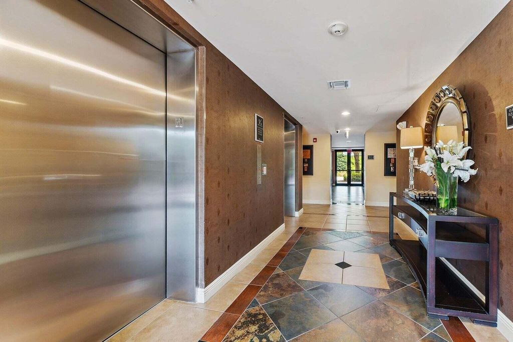 Photo of 4907 Midtown Lane #1203, Palm Beach Gardens, FL 33418 (MLS # R10968826)