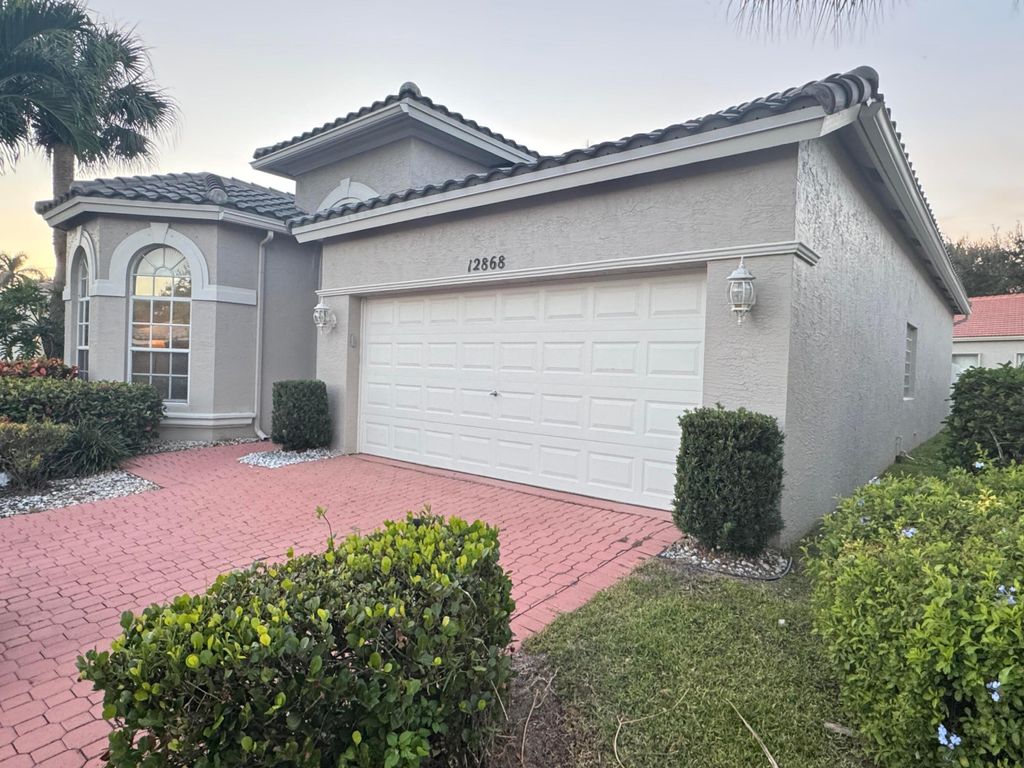 Photo of 12868 Coral Lakes Dr, Boynton Beach, FL 33437 (MLS # R11159476)