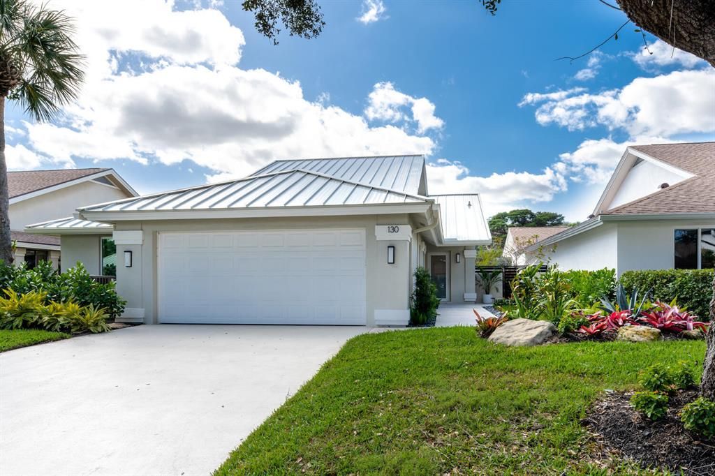 Photo of 130 Sand Pine Drive, Jupiter, FL 33477 (MLS # R10876146)