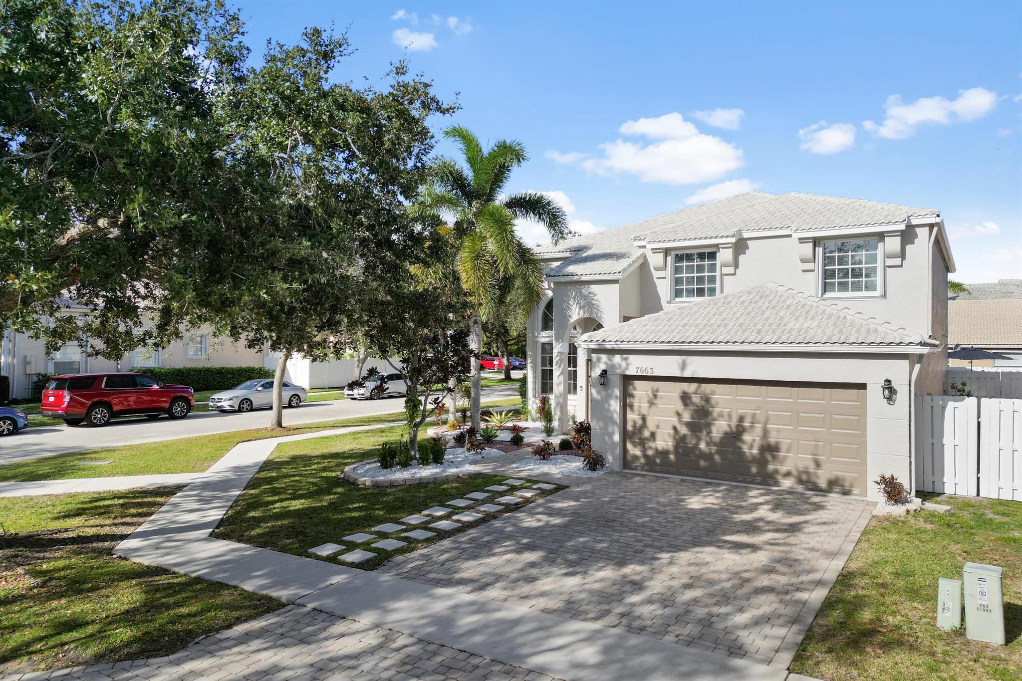 For Rent: Beautiful Residence at 7663 Great Oak Drive, Lake Worth, FL 33467. Discover your ideal living space in the heart of Lake Worth! This stunning 4 bedroom, 3 bathroom residence is designed to offer both comfort and elegance, making it a sanctuary for you and your family. Property Highlights: Enjoy a spacious open-concept living area that is flooded with natural light, creating a warm and inviting atmosphere. The modern kitchen is a chef's delight, featuring high-quality stainless steel appliances, generous counter space, and an abundance of cabinetry for all your culinary needs. Each of the generously sized bedrooms provides ample closet space, ensuring that you have plenty of room to store your belongings. The bathrooms have been tastefully updated with contemporary fixtures,