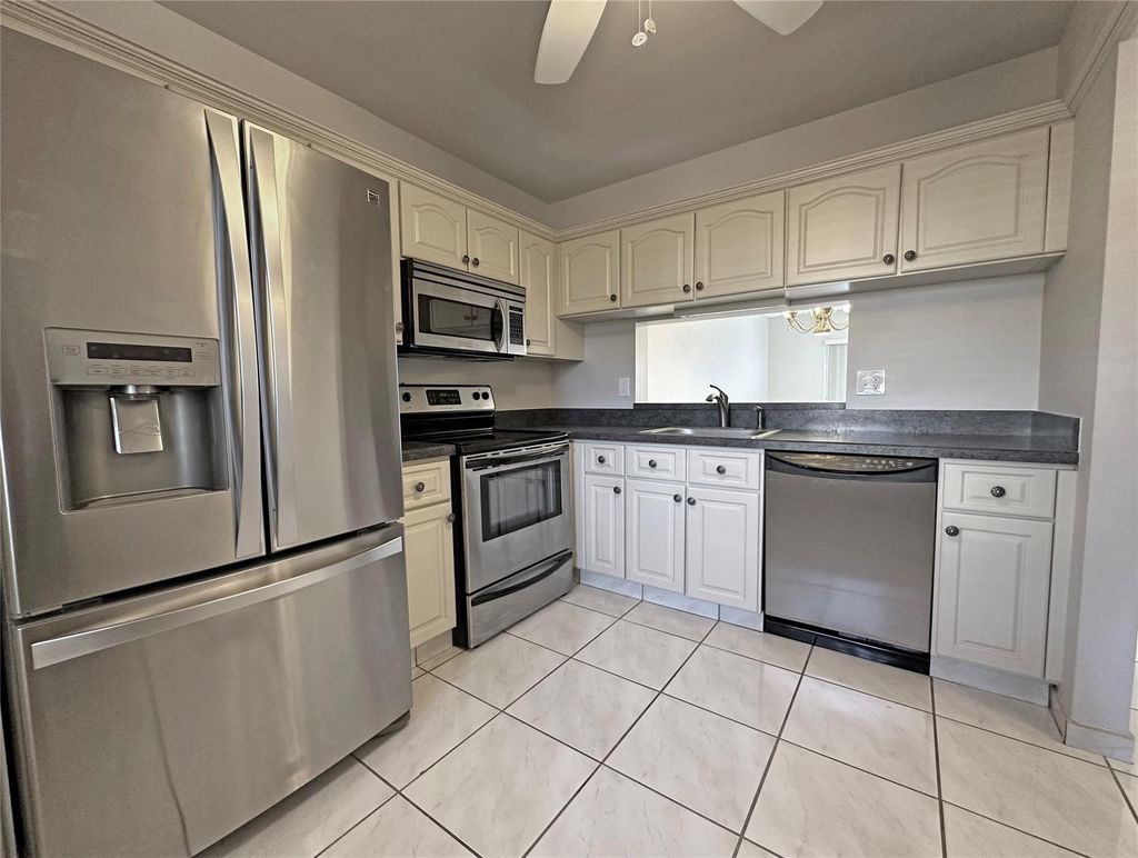 Photo of 3001 Holiday Springs Blvd #102, Margate, FL 33063 (MLS # F10534493)