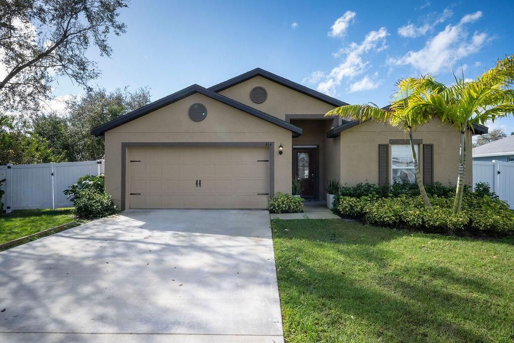 Photo of 414 SW Dahled Avenue, Port Saint Lucie, FL 34953 (MLS # R11065143)
