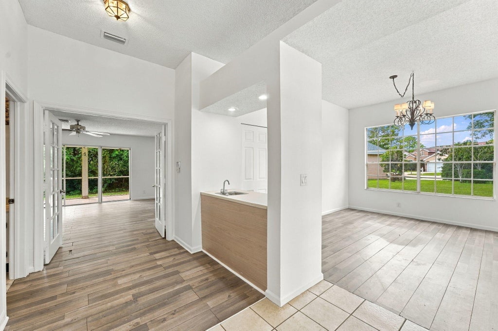 Photo of 1015 LAKE BREEZE Drive, Wellington, FL 33414 (MLS # B26088589)